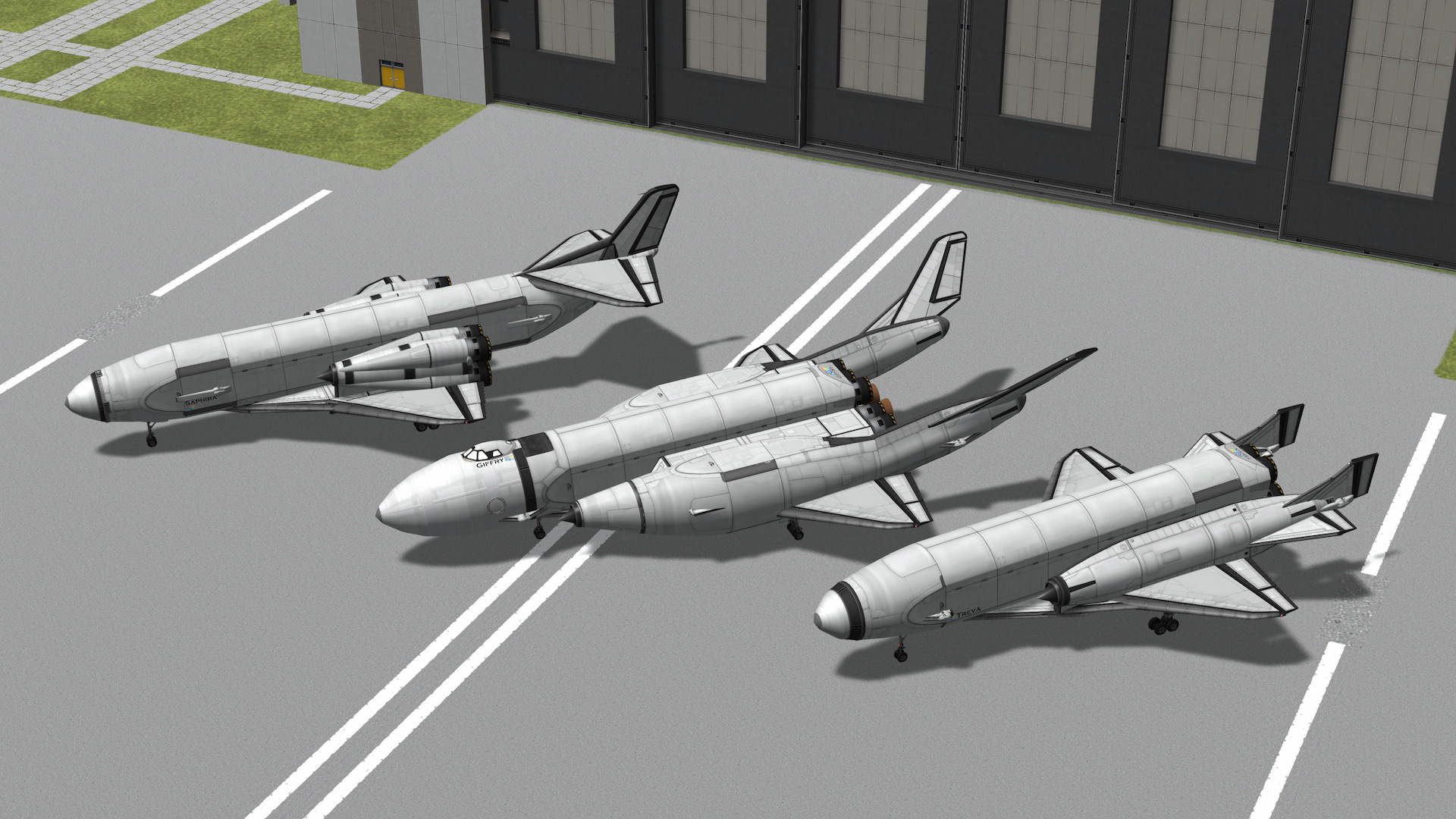 three spaceplanes parked beside each other in front of the hangar, seen from above